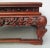 Fine hardwood Chinese rectangular stand. Deeply carved apron with four corner legs with raised Chinese fret feet. The very...
