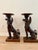 A dramatic pair of hand-carved pedestal tables, each fashioned as a mythological winged griffin — part eagle, part lion —...