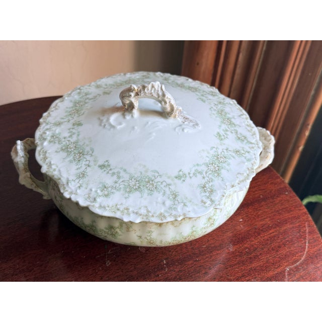 Late 19th Century Elite Works Limoges France porcelain covered tureen with lid. White porcelain with small green floral...