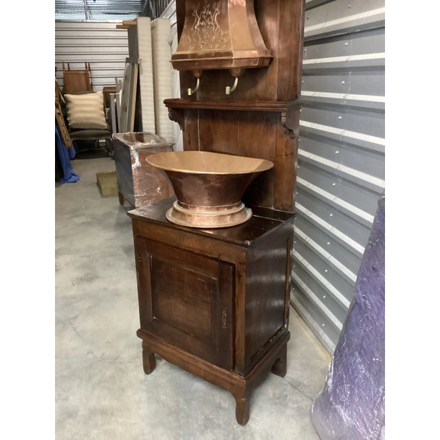 This Lavabo, or French wash-stand, is highly decorative and full of history. Constructed of chestnut, it features a panel...