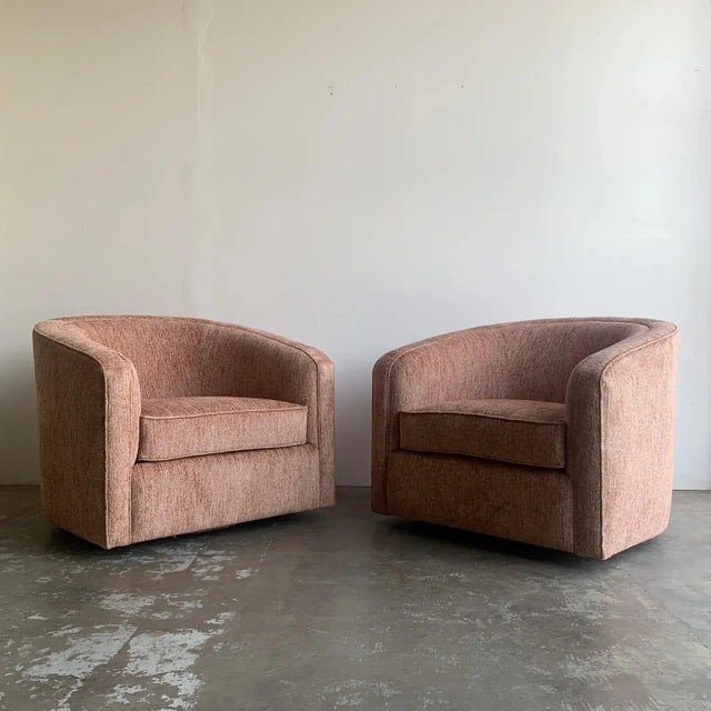 Mid-century custom barrel swivel chairs. Unlike most barrel chairs this set includes wider seating dimensions. Fully...