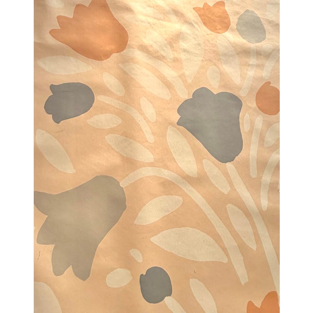 76’ of 4-ft-wide roll of vintage 1978 Jack Lenor Larsen wallpaper in a soft palette of blue, gray, pink, and orange. This...