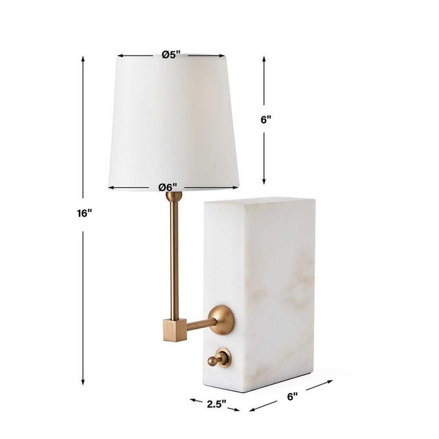 Classy! Create a warm and inviting glow on any bookshelf. Similar in size to a book, nestle this mini lamp between novels,...