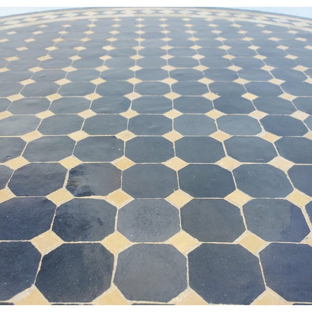 100 % glazed round. Moroccan mosaic table measuring approximately 40" in diameter and 29" Hight. For both indoors and...