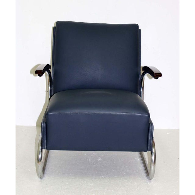 A beautiful chrome tubular steel cantilever chair made by ther famous Thonet brothers in Austria. It provides excellent...