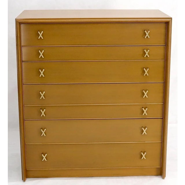 Mid-Century Modern seven drawer with brass X-Pulls high chest dresser by Paul Frankl for Johnson Furniture.