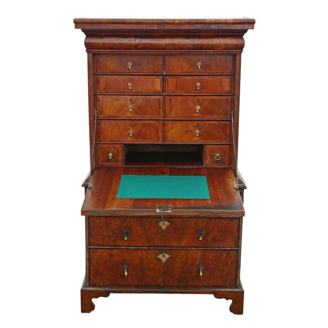 This fine-quality early 18th Century Queen Anne escritoire is full of authentic charm and character. The elegant period...