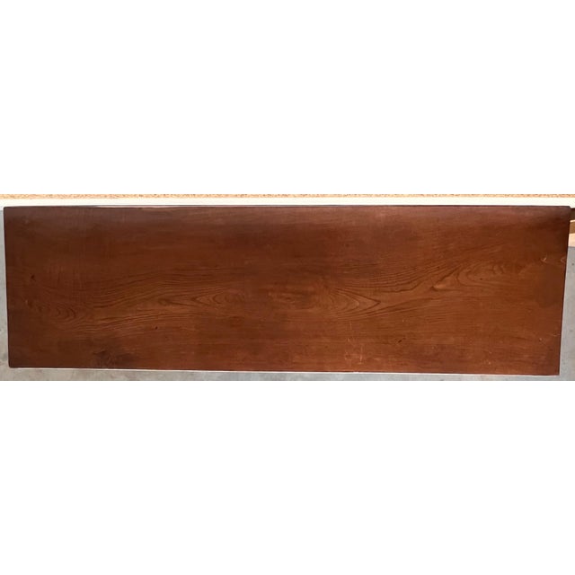 Dining table made of walnut with carved lyre legs and heavy top. The lyre legs are very thick. Beautiful iron stretcher,...