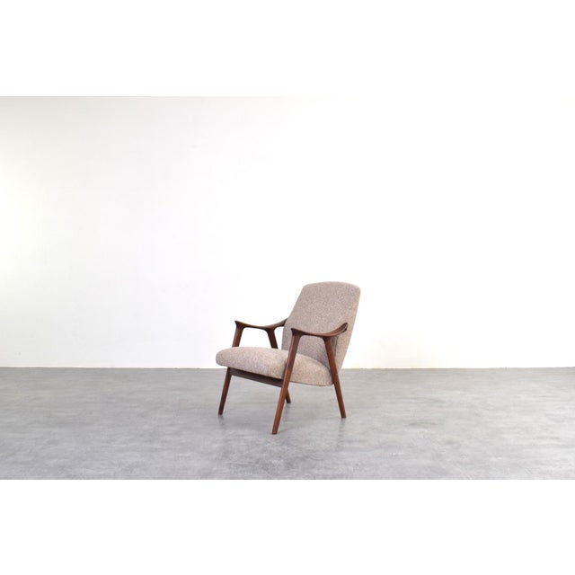 The “Tenor” armchair produced by Møre Lenestolfabrikk in Norway during the 1960s represents mature Scandinavian modern...