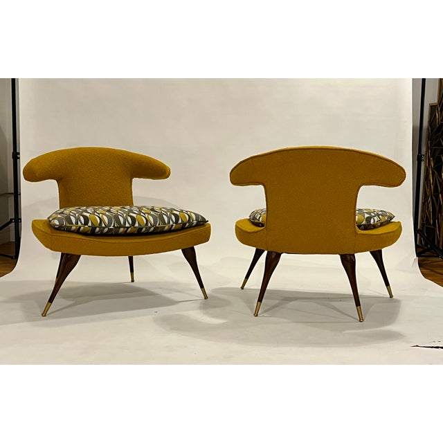 Pair of vintage "Horn" lounge chairs attributed to Karpen of California. These iconic mid-century slipper chairs have been...
