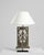 Made from a piece of reclaimed wooden ornament, this table lamp makes a truly unique accent. The base was originally...