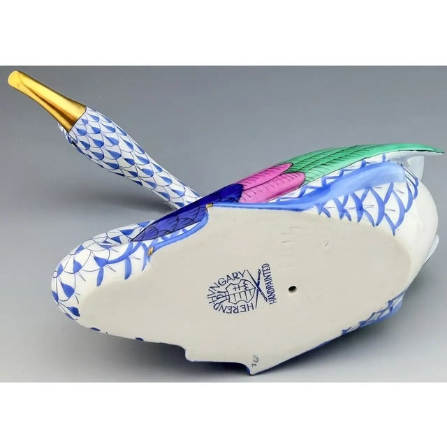 Elegant vintage Mid-Century Modern Herend swan figurine in the iconic blue fishnet pattern. This hand-painted porcelain...