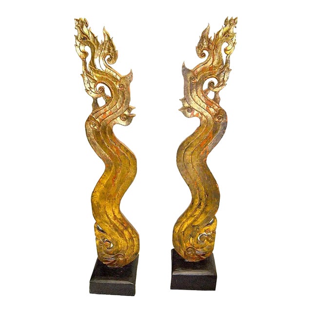 Pair of Gilt Wood Asian Naga Sculptures on Ebonized Bases For Sale