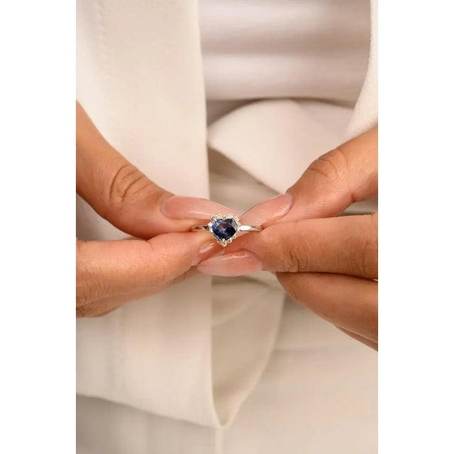 This is part of Chairish’s Fine Jewelry assortment. Diamond Halo Blue Sapphire Birthstone Heart Ring in 14K Gold featuring...