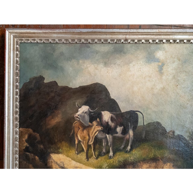 We are selling this charming 19th century oil on canvas painting of a Cow and calf. This painting is professionally...