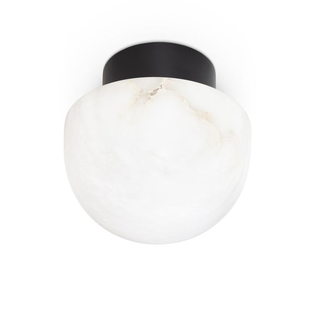 The Parker is a deco inspired flush mount featuring a striking globe made of natural alabaster and metal canopy. Let the...