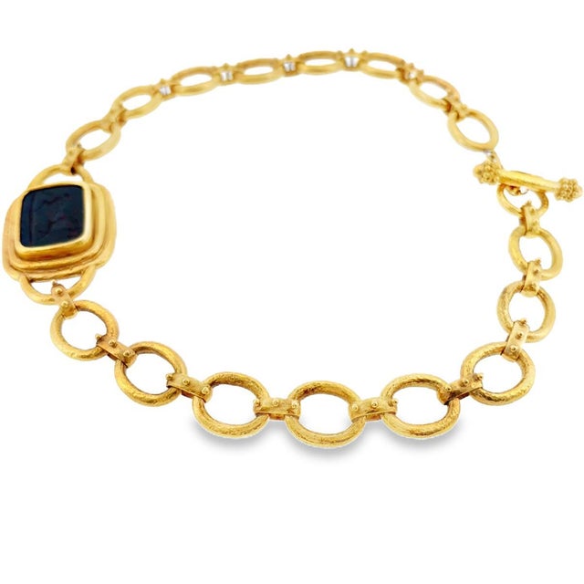 Elizabeth Locke 18K yellow gold hammered finish toggle necklace, featuring a cushion shape bloodstone intaglio with an...
