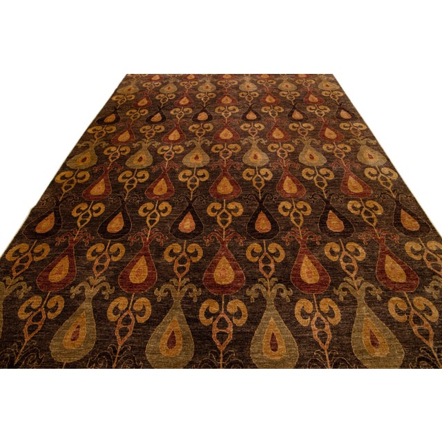 Beautiful modern Ikat hand-knotted wool rug with a brown field. This Modern rug has red and goldenrod accents gorgeous...