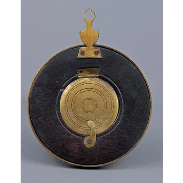 Sedan chair or coach clock case or pocket watch holder crafted from solid carved mahogany with gilded brass trim.