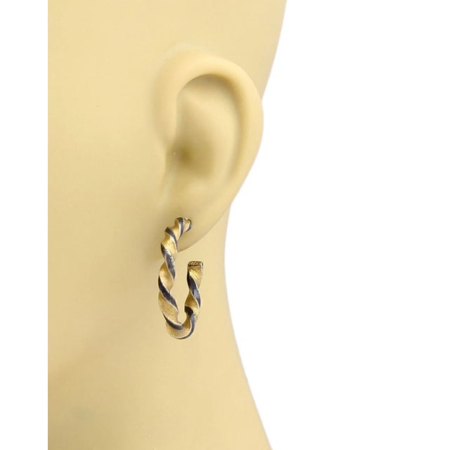 This is a lovely authentic pair of hoop earrings by Gurhan from the MIDNIGHT collection, the pair is crafted from darkened...