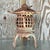 This vintage Boho pagoda lantern, beautifully patinated with an aged finish, captures a sense of timeless, exotic...