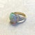 Created in 18 karat yellow gold Ethiopian Opal 7 cts approx Diamonds 1.25 cts approx Ring size US 7, can be sized One of a...