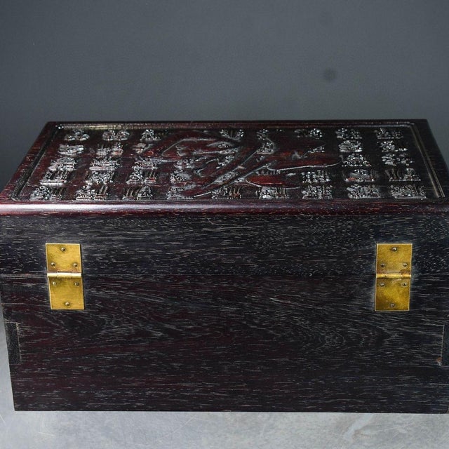 An impressive and substantial vintage Chinese storage box, handcrafted from dense Zitan wood (purple sandalwood). This...