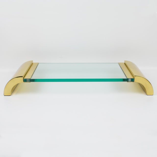 This stunning brass and glass pedestal centerpiece or display tray was meticulously designed and crafted in Italy, circa...