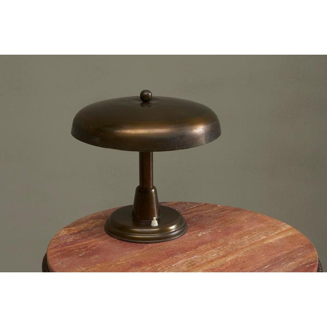 A stunning italian mid century table lamp in patinated brass. Truly one of the best examples we’ve seen in this genre,...