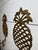 Add a touch of timeless elegance to your home with this exquisite pair of vintage brass pineapple wall candle sconces....