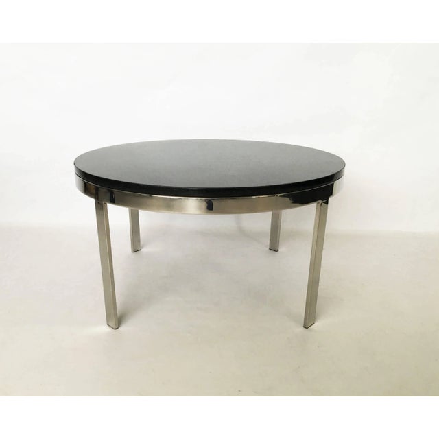 Exceptional Brueton quality! Simple design this circular PBLR table constructed of mirror like finish stainless steel flat...