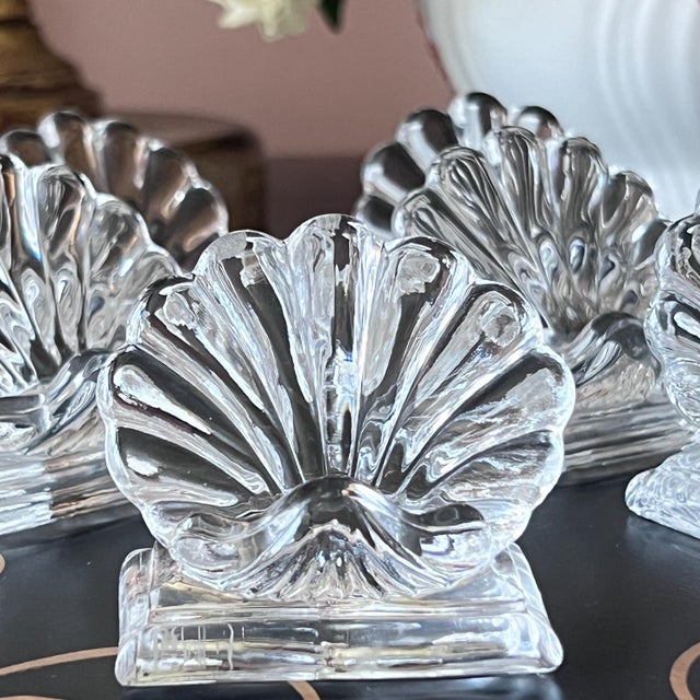 This is a beautiful set of 10 crystal scallop shell place card holders by the luxury French brand Baccarat. These are just...
