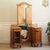 An elegant oak dressing table with a three-panel folding mirror and original marble tops, dating from around 1900 during...