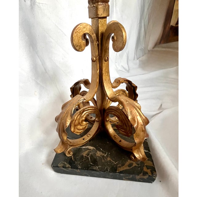 Stunning gilt bronze floor lamp. Barley twist design with ornate acanthus leaf scrolled foot and candle holder all set on...