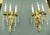 Meticulously restored, these wall sconces boast intricate gold-gilded bronze detailing and sparkling crystals. Illuminate...
