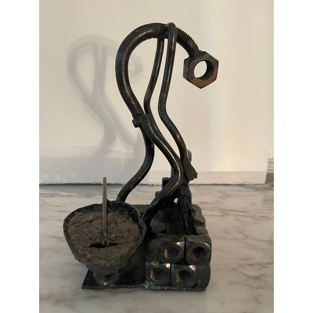 The mason man is a representation of a life of back breaking hard work and how it eventually takes a toll on the body. As...