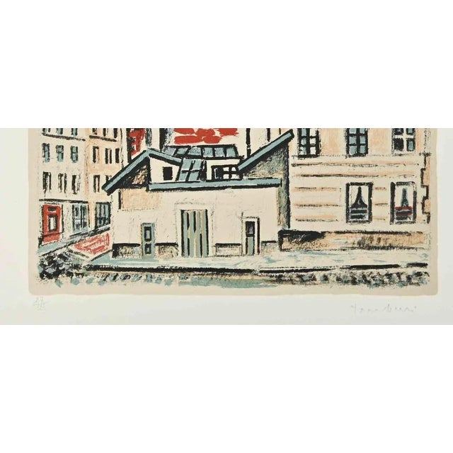 View of Paris is a Modern artwork realized by Orfeo Tamburi (Jesi, 1910 – Paris,1994) in the 1970s. Colored Etching and...