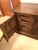 This maple colored sturdy but elegant sideboard enhanced the look of our dining room since our purchase from Carafiol, an...