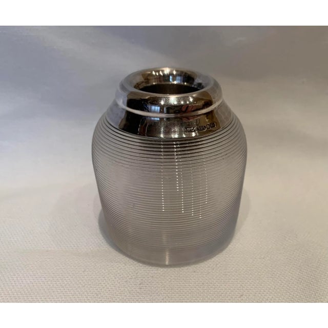 Turn-of-the-century British glass match striker with silver top. Purchased in London in the late 1980s.
