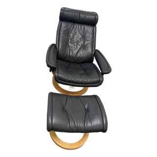 1980s Ekornes Stressless Black Leather Recliner and Ottoman, Norway For Sale