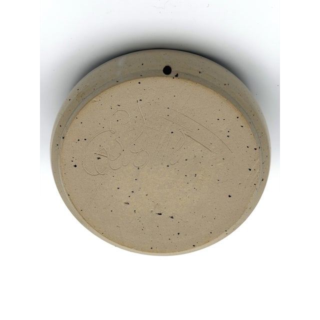 Handcrafted ceramic wall candle holder by Egebølle Keramik, Denmark, dating from the 1960s–1970s. Featuring a softly...