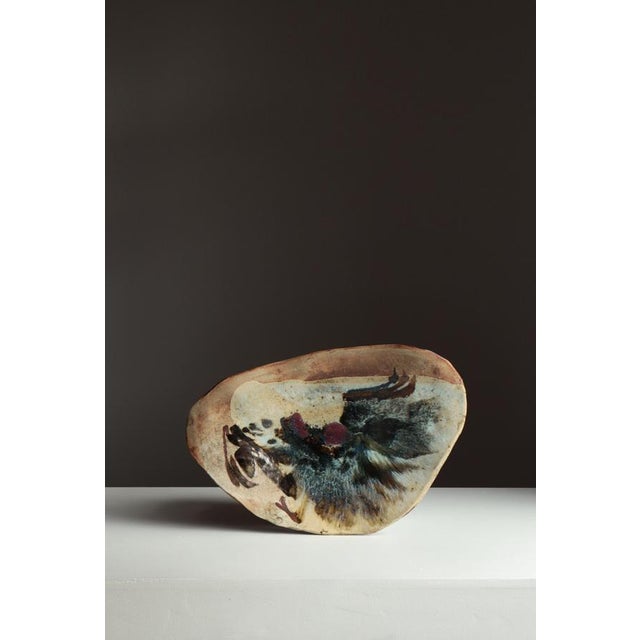 A striking example of mid-century Danish studio ceramics, this expressive stoneware dish by Conny Walther embodies the...