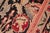 Ikat Floral 1990's Pak-Persian Black/Red Wool Rug - 6'0'' X 9'5'' For Sale In New York - Image 6 of 9