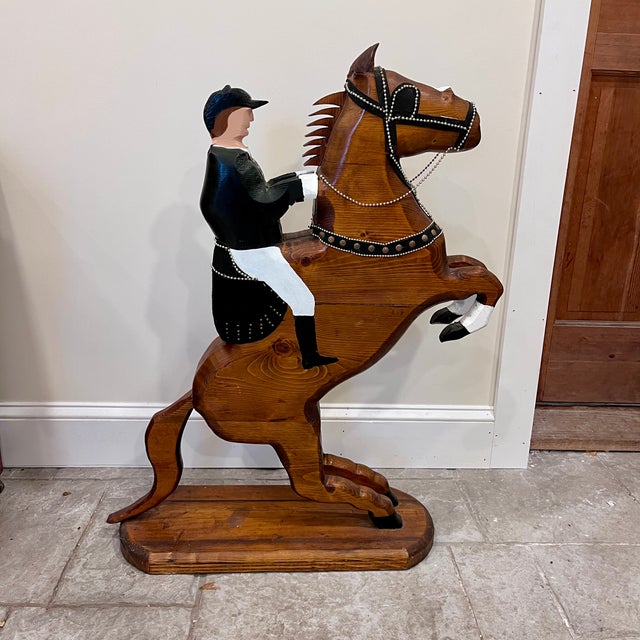 One of a kind artisan crafted equestrian sculpture of an English huntseat rider on a rearing horse. This is made of hand...