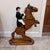 One of a kind artisan crafted equestrian sculpture of an English huntseat rider on a rearing horse. This is made of hand...