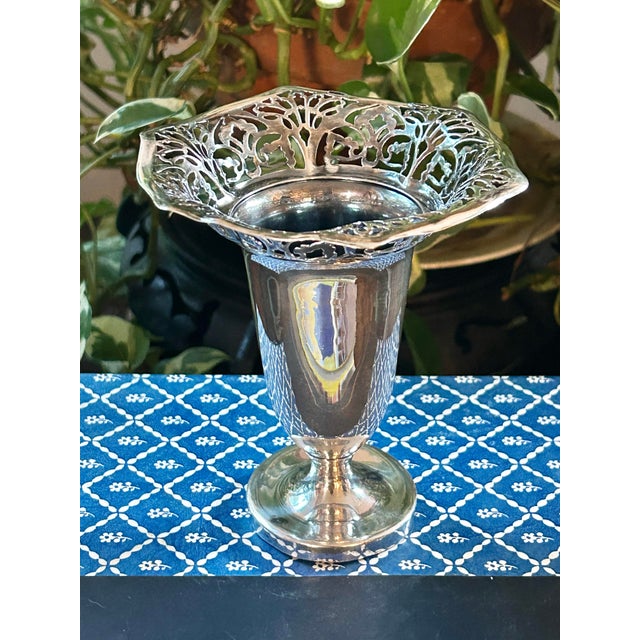 This is a vintage silverplate posy vase by Hallmark Silver Co., featuring an unusually elaborate pierced floral gallery...
