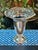 This is a vintage silverplate posy vase by Hallmark Silver Co., featuring an unusually elaborate pierced floral gallery...