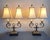 Up for consideration is a striking, highly collectible pair of mid-century twin table lamps heavily echoing the grand...
