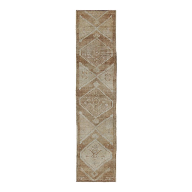 Vintage Turkish Oushak Runner Neutral and Warm Colors With Tribal Medallions For Sale