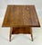 A classic late 19th- to early 20th-century American Victorian parlor table crafted from solid quarter-sawn "tiger" oak....